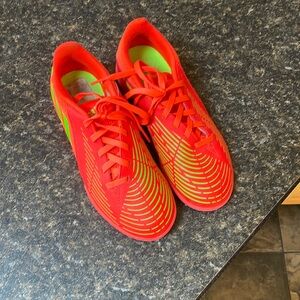 Kids adidas predator soccer shoes.